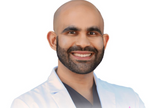 Dr Karan Lal
